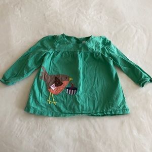 Baby Boden green top with bird appliqué.